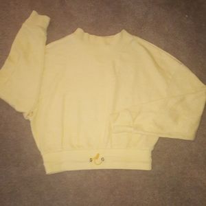 A yellow top, never worn